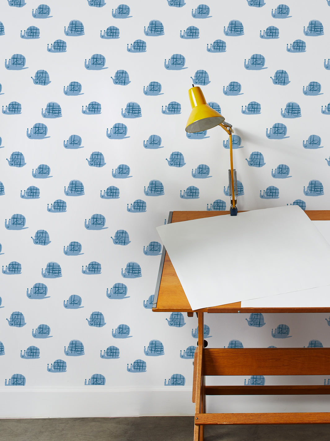 snails wallpaper by tea collection cornflower 1